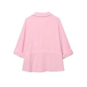 Detail of light pink blazer with notched lapels and cuffed sleeves for women