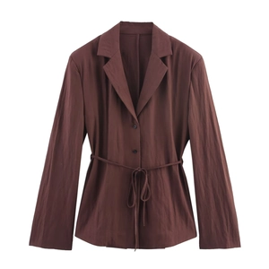Detail of dark brown striped blazer featuring classic lapels and adjustable waist tie