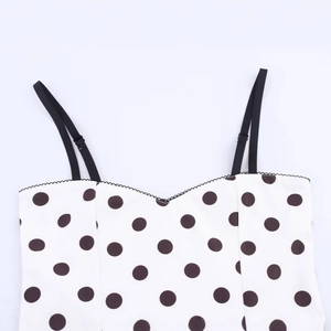 Polka dot camisole top with black lace trim and adjustable thin shoulder straps