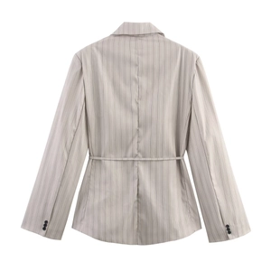 Rear view of striped light gray blazer with shoulder pads and a matching tie belt detail