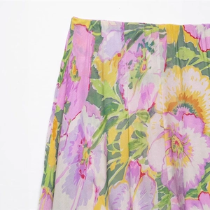 Women's 2025 spring floral print long skirt with colorful abstract patterns and elastic waist