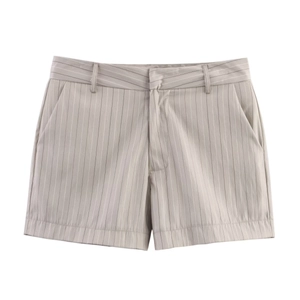 Detail of high-waisted striped shorts with side pockets and elegant vertical pattern