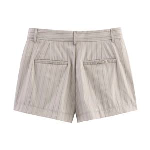 Detail view of striped beige shorts featuring back welt pockets and belt loops