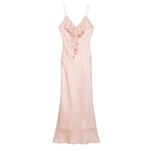 Detailed view of pale pink satin dress with layered ruffles and delicate drawstring