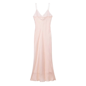 Close-up of pink satin maxi dress showing the silk texture and elegant fishtail hemline