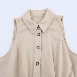 Linen button-down sleeveless dress in beige featuring a lapel collar and marble buttons