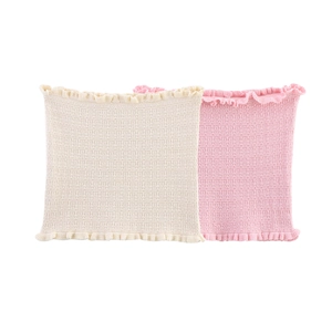 Ensemble trois pièces en tricot avec hauts bandeau à volants et jupe en rose et blanc