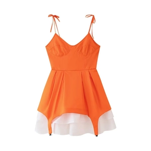 Women's orange bustier mini dress with white tiered ruffles and bow straps