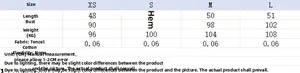 Detailed size chart for the polka dot top including chest and length measurements