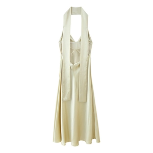 Champagne satin halter neck maxi dress with backless tie detail and elegant silky drape