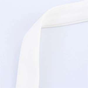 Macro detail of white chiffon halter top showing delicate fabric texture and fine stitching