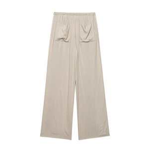 Detail of oatmeal wide-leg pants with elastic waist and lace trim on the side seams