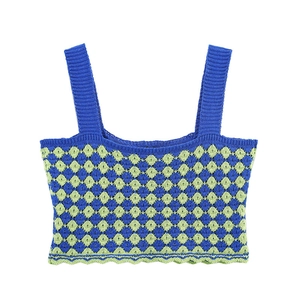 Detail of royal blue and lime green checkered knit crop top with scalloped hem edges