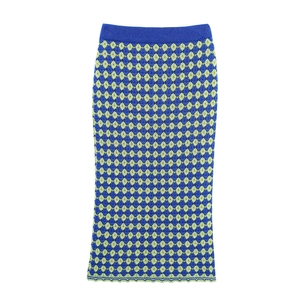 Detail of blue and green harlequin knit skirt with wide ribbed elastic waistband