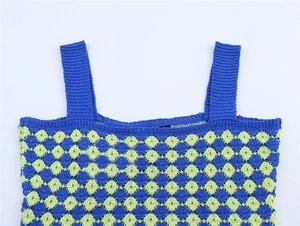 Detail view of the knit crochet camisole top with vibrant green and blue checkered pattern