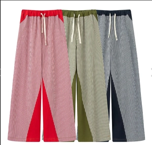 Detail of color block striped wide-leg pants with elastic drawstring waist in three colors