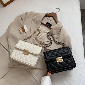 Chic quilted crossbody bag with gold chain strap in black and beige colors