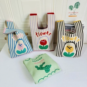 Vertical striped knitted tote bags with floral patterns and soft woven texture