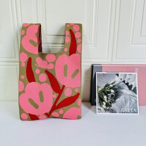 Pink and red knitted floral tote bag with abstract flower pattern for women