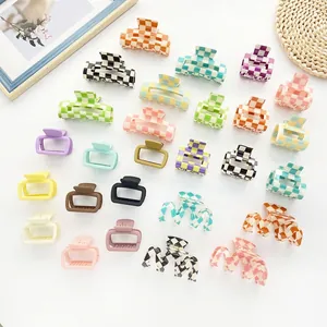 Matte checkerboard and macaron color large hair claws assortment in various shapes