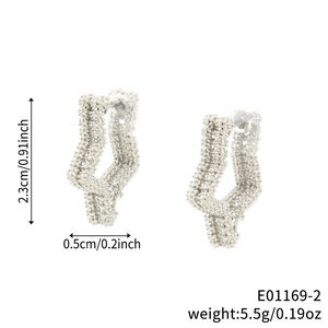 Textured silver star-shaped hoop earrings with unique geometric irregular design