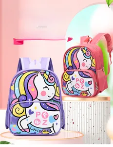 Detail showing the waterproof fabric and cute unicorn pattern on the pink school bag