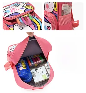 Pink unicorn kids backpack showing multi-pocket storage for stationery and supplies