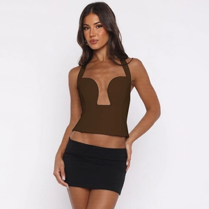 Detail of the deep U-neck slim fit tank top in dark brown and black mini skirt