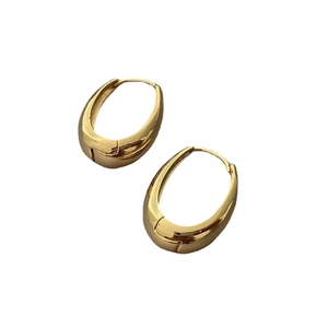 Elegant gold-tone drop hoop earrings with a polished finish and minimalist oval design