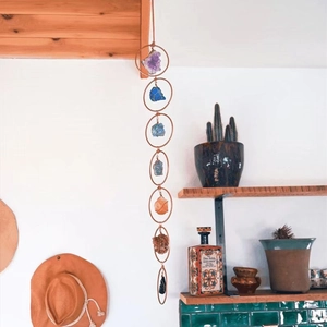 Bohemian style seven chakra natural gemstones wall hanging decor in cozy home setting
