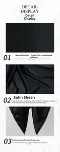 Close-up of black satin scarf fabric showing silk sheen and fine stitching detail