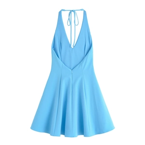 Detail of light blue halter neck dress featuring deep V-neck and invisible back zipper