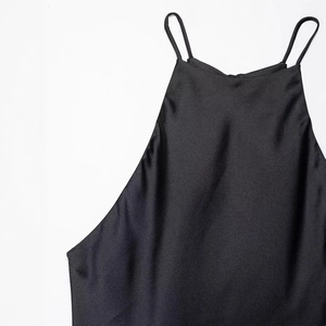 Elegant black satin halter neck dress for women with minimalist thin straps and glossy finish