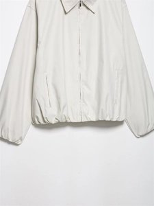 Front view of a minimalist light grey bomber jacket with elastic cuffs and hem detail