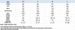Detailed size chart for the polka dot mini dress showing measurements in centimeters