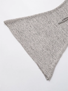 Detailed macro view of heather grey knitted fabric texture with ribbed stripe patterns
