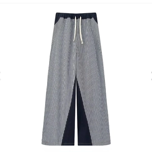 Women's blue and white striped wide leg pants with color-block patchwork and drawstring waist