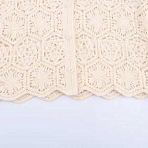 Elegant cream white crochet cardigan with intricate floral patterns and wave hem