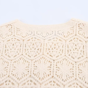 Cream crochet long sleeve top featuring detailed hexagonal floral knit patterns