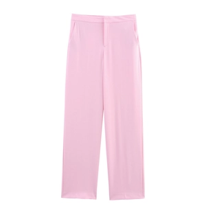 Detail view of light pink high-waisted wide-leg trousers with side pockets and smooth finish