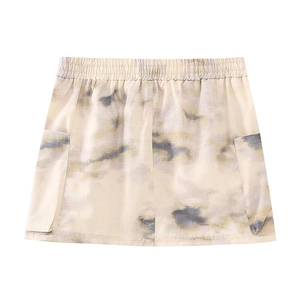 Detail of cargo mini skirt with tie-dye camo print and elastic waistband with pockets