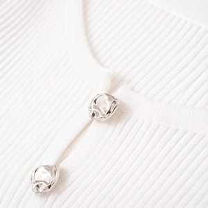 Women's white ribbed knit cardigan with artistic liquid metal buttons for 2025 spring