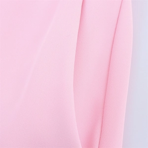 Detail of pink twill fabric texture and clean stitching for women blazer suit