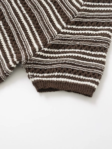Detail of hollow-knit texture and brown white striped pattern on casual short sleeve top