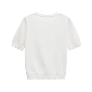 Detailed view of white short sleeve knit top showing ribbed crew neck and soft texture
