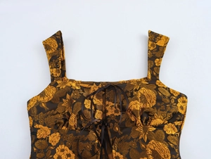 Close-up of vintage brown floral jacquard camisole with decorative front lace-up detailing