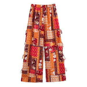 Women's bohemian high-waisted wide leg pants with paisley ethnic print and side bows
