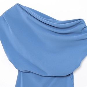 Women's dark blue off-shoulder dress with elegant pleats and asymmetrical neckline