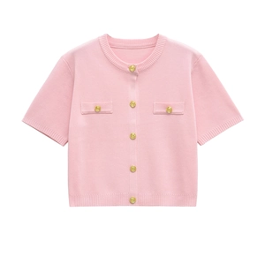 Pink short sleeve knit dress with gold buttons and ribbed trim on white background