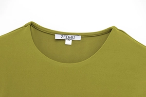 Detail shot of the olive green knit neckline with white size S brand label